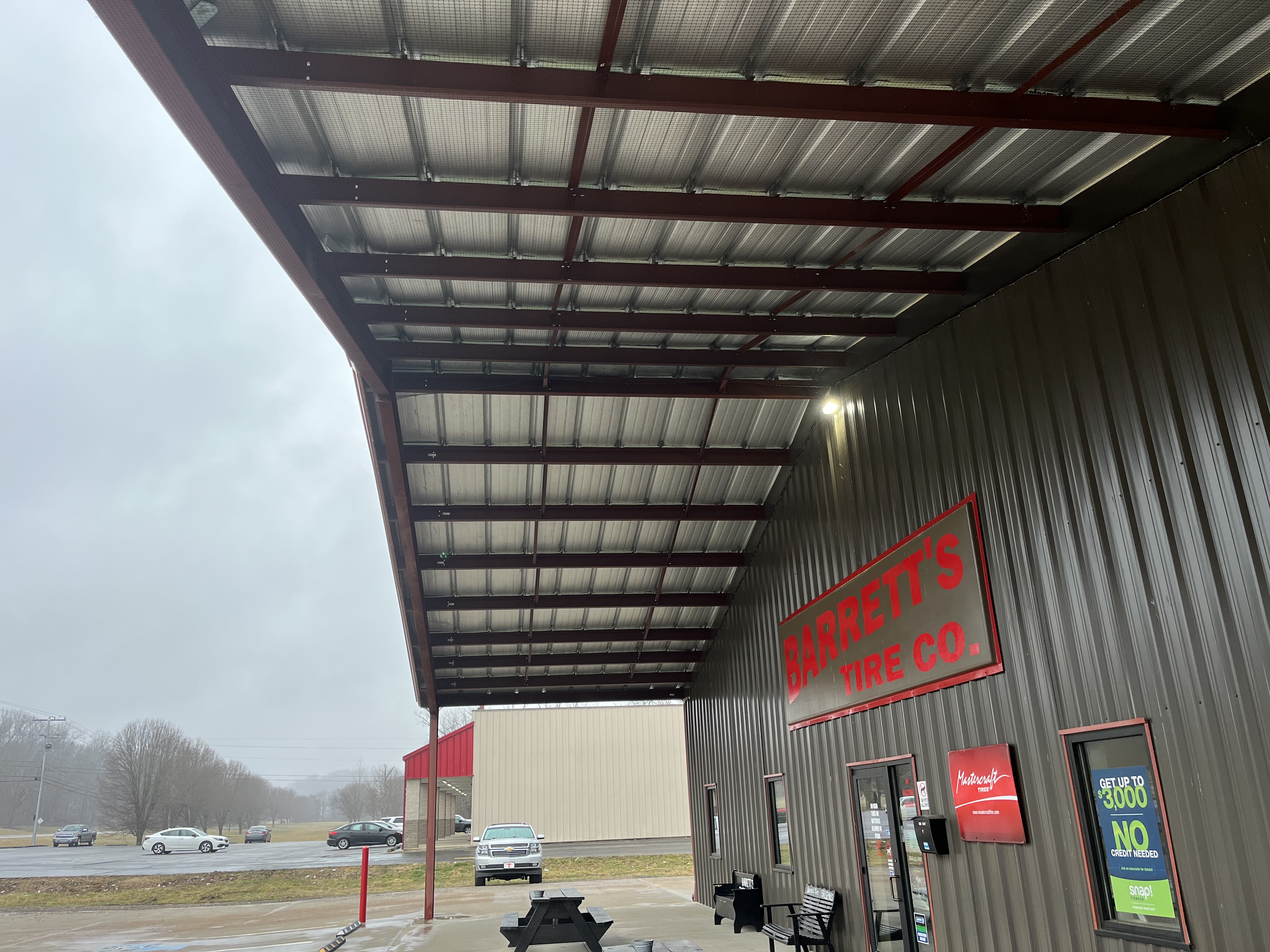 Commercial building exterior with bird deterrent system